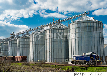 A large modern plant for the storage and processing of grain crops. Agro-processing manufacturing plant for processing drying cleaning and storage of agricultural products. Export of grain by railway A large modern plant for the storage and processing of grain crops. Agro-processing manufacturing plant for processing drying cleaning and storage of agricultural products. Export of grain by railway 122663358