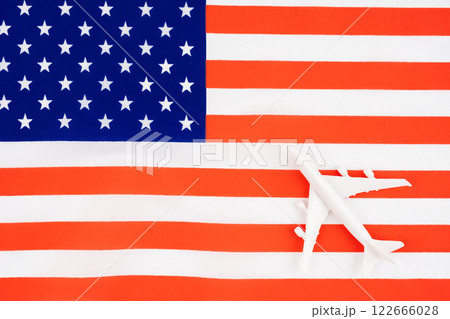Toy airplane on flag of United States of America. Flat lay. Toy airplane on flag of United States of America. Flat lay. 122666028