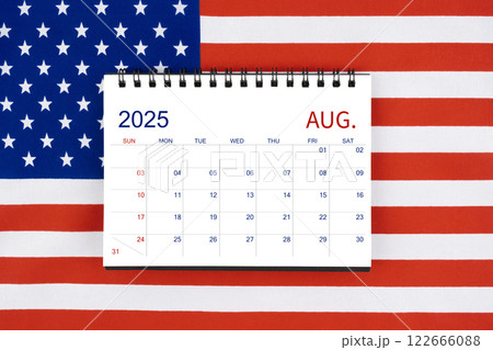 August 2025 desk calendar on United States of America flag. 122666088