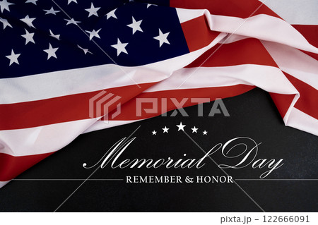 Happy Memorial Day. American flags with the text REMEMBER & HONOR against a black background. 122666091