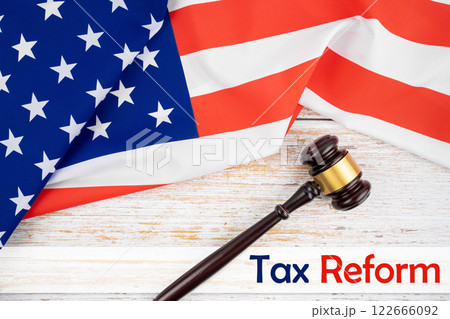 Wooden gavel and flag of United States of America. Wooden gavel and flag of United States of America. 122666092