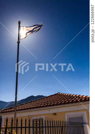 Blue and white Greek flag waving on wind 122666997