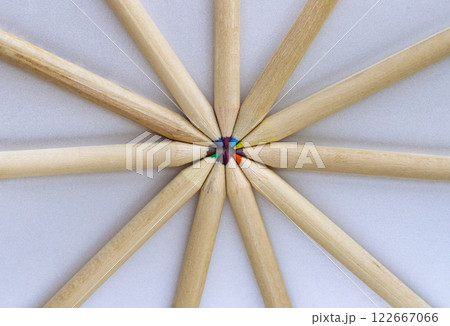 Top view of Brown crayons arranged in a circle on silver background. Top view of Brown crayons arranged in a circle on silver background. 122667066