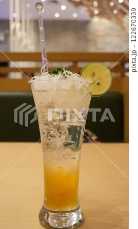 Savor the Yuzu Mocktail, a delightful fusion of yuzu, Japanese citrus fruits, and a hint of mint, expertly mixed into a perfect non-alcoholic beverage for a refreshing and zesty experience. Savor the Yuzu Mocktail, a delightful fusion of yuzu, Japanese citrus fruits, and a hint of mint, expertly mixed into a perfect non-alcoholic beverage for a refreshing and zesty experience. 122670339