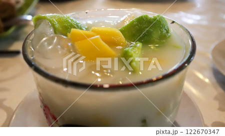 Es Teler Avocado and Jackfruit, Indonesian delight with shaved ice, avocado, coconut, grass jelly, in a blend of coconut milk, condensed milk, pandan syrup, sugar. Sweet, fresh, and creamy. 122670347