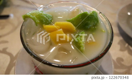Es Teler Avocado and Jackfruit, Indonesian delight with shaved ice, avocado, coconut, grass jelly, in a blend of coconut milk, condensed milk, pandan syrup, sugar. Sweet, fresh, and creamy. 122670348