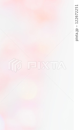 薄いピンク色グラデーションのふんわり背景　パステル玉ボケ 122672251