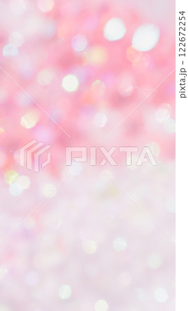 かわいいピンク色のキラキラぼかし背景　きれいカラフル　玉ボケ 122672254