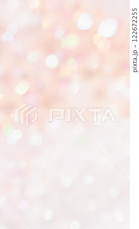 暖かいオレンジ色のふわふわキラキラ背景　秋の玉ボケ　 122672255