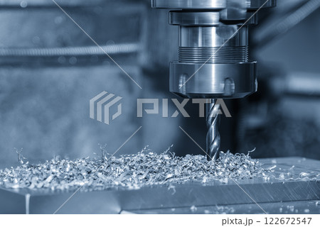 The hole drilling  process on NC milling machine with aluminum parts. 122672547