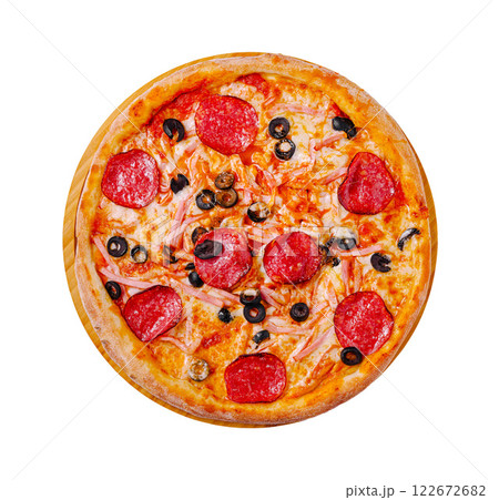 Tasty pepperoni pizza topped with olives and cheese on a wooden board served in a restaurant setting 122672682