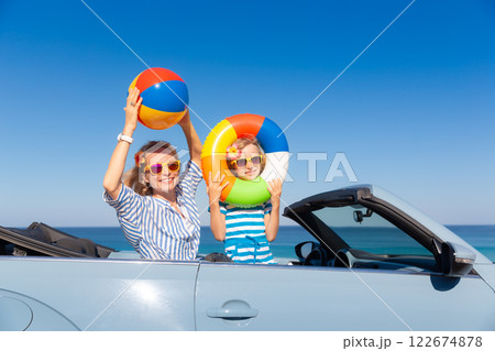 Happy family travel by car by the sea 122674878