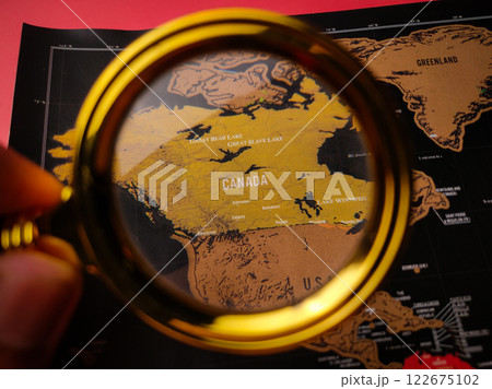 Closeup magnifying glass and focus to CANADA map. Closeup magnifying glass and focus to CANADA map. 122675102