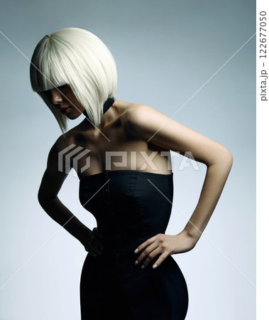 beautiful blond hair young woman. fringe and bob hairstyle. fashion girl with white hair beautiful blond hair young woman. fringe and bob hairstyle. fashion girl with white hair 122677050