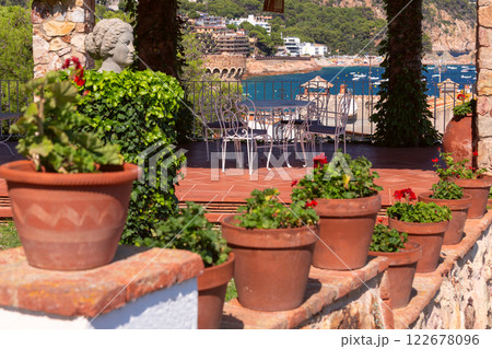 Terrace with Stone Pergola Overlooking the Sea in Tossa de Mar, Catalonia, Spain 122678096