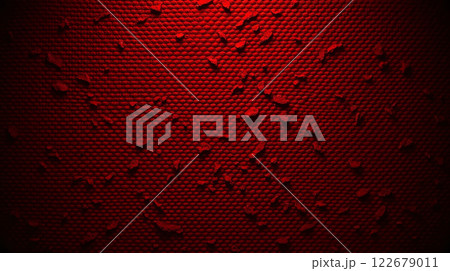 Red textured surface with chipped paint creating dramatic light and shadow 122679011