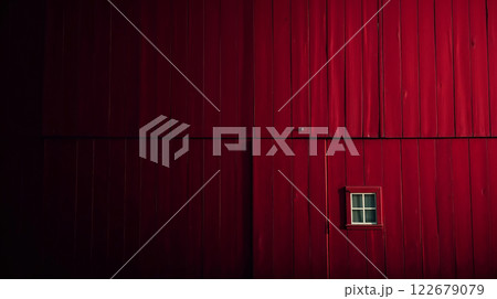 Red barn wooden wall showing small window and wood texture 122679079