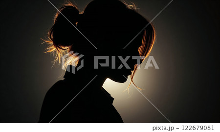 Profile of a lonely woman showing mystery, thinking with backlit hair 122679081