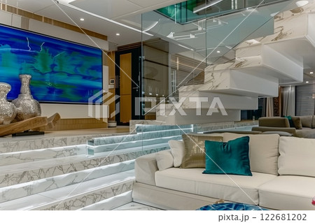 Modern luxury living room with marble stairs and artistic decor 122681202