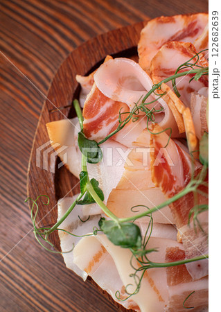 Beautiful slicing of fat and delicious fresh bacon Beautiful slicing of fat and delicious fresh bacon 122682639
