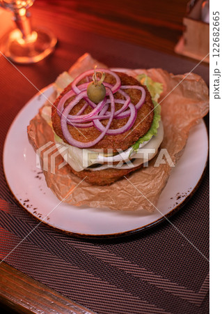 Juicy mouth-watering fatty burger made from grated Juicy mouth-watering fatty burger made from grated 122682665