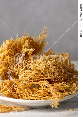 Sea Moss, irish wild harvested dried seaweed, healthy used as food supplement. Sea Moss, irish wild harvested dried seaweed, healthy used as food supplement. 122683866