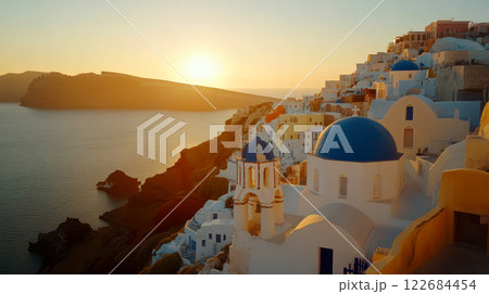 Santorini Sunset Breathtaking View of Iconic Blue Domes and Aegean Sea. 122684454