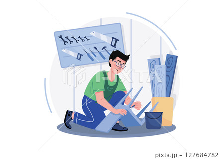 Carpenter Working In A Workshop Carpenter Working In A Workshop 122684782