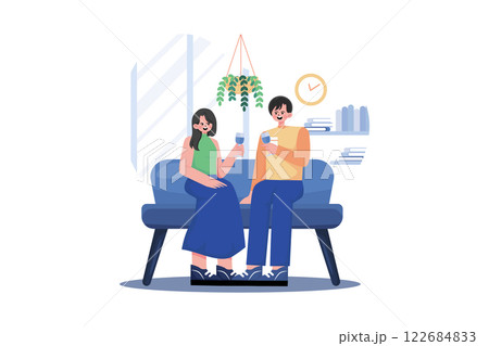 Young Couple Sitting At Armchairs In The Room Holding Wineglasses 122684833