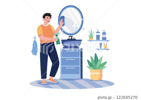 Man Cleaning Mirror In The Bathroom 122685270