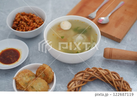 traditional Indonesian food arranged neatly on a table surface traditional Indonesian food arranged neatly on a table surface 122687119