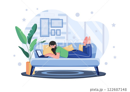 Man Laying On The Couch And Doing Work On A Laptop 122687148