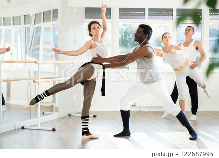 Adult man and adult woman rehearsing pair ballet Adult man and adult woman rehearsing pair ballet 122687995