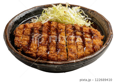 plate of tonkatsu with shredded cabbage, isolated background 122689410