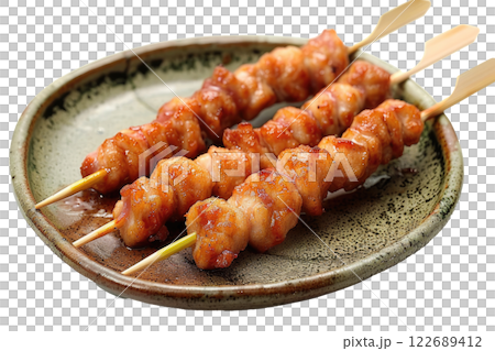 plate of yakitori skewers isolated on a white background plate of yakitori skewers isolated on a white background 122689412