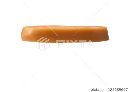 ripe slice of carrot floating, isolated background 122689607