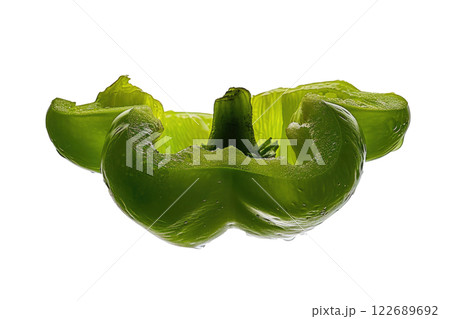 ripe slice of green bell pepper floating, isolated background 122689692