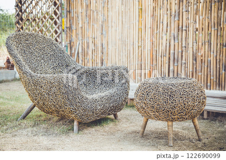 Rattan chair at garden 122690099