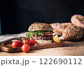 Hamburger homemade on wood table. 122690112