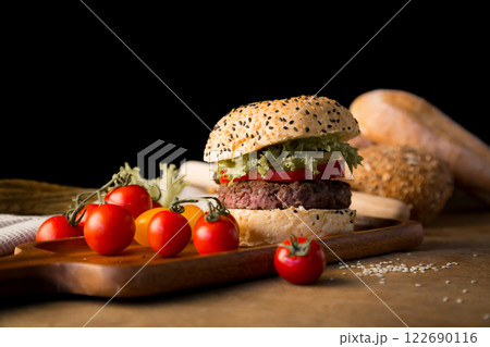 Hamburger homemade on wood table. 122690116