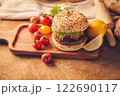 Hamburger homemade on wood table. 122690117