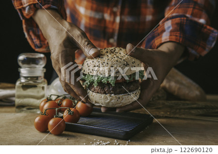 Chef making hamburger homemade. Chef making hamburger homemade. 122690120