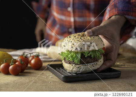 Chef making hamburger homemade. 122690121