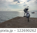 Bicycle beside the beach. 122690262