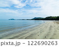 The sand beach and the sea. 122690263