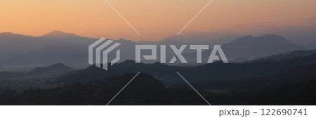 Golden sky ober hills near Pokhara, Nepal. Golden sky ober hills near Pokhara, Nepal. 122690741