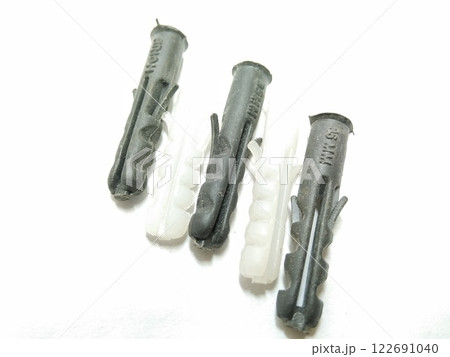 A picture of plastic screws isolated on white background A picture of plastic screws isolated on white background 122691040