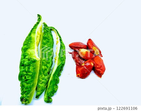 A picture of Bitter gourd seed's on white background A picture of Bitter gourd seed's on white background 122691106