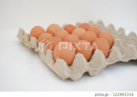 Eggs in a carton. Selective focus. Eggs in a carton. Selective focus. 122691318
