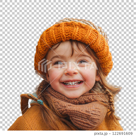 A young girl wearing a knitted hat smiles brightly while riding a carousel A young girl wearing a knitted hat smiles brightly while riding a carousel 122691609